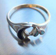 VINTAGE RING WITH DOLPHIN. STERLING SILVER. UNUSED