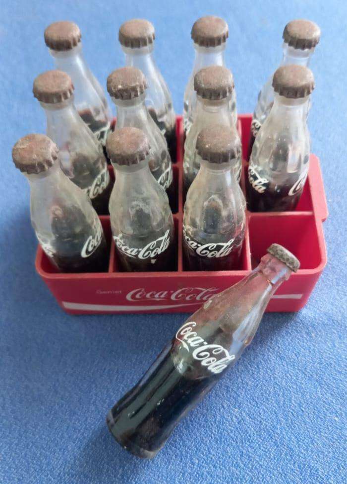 COLLECTABLE MINIATURE COKE BOTTLES IN CRATE