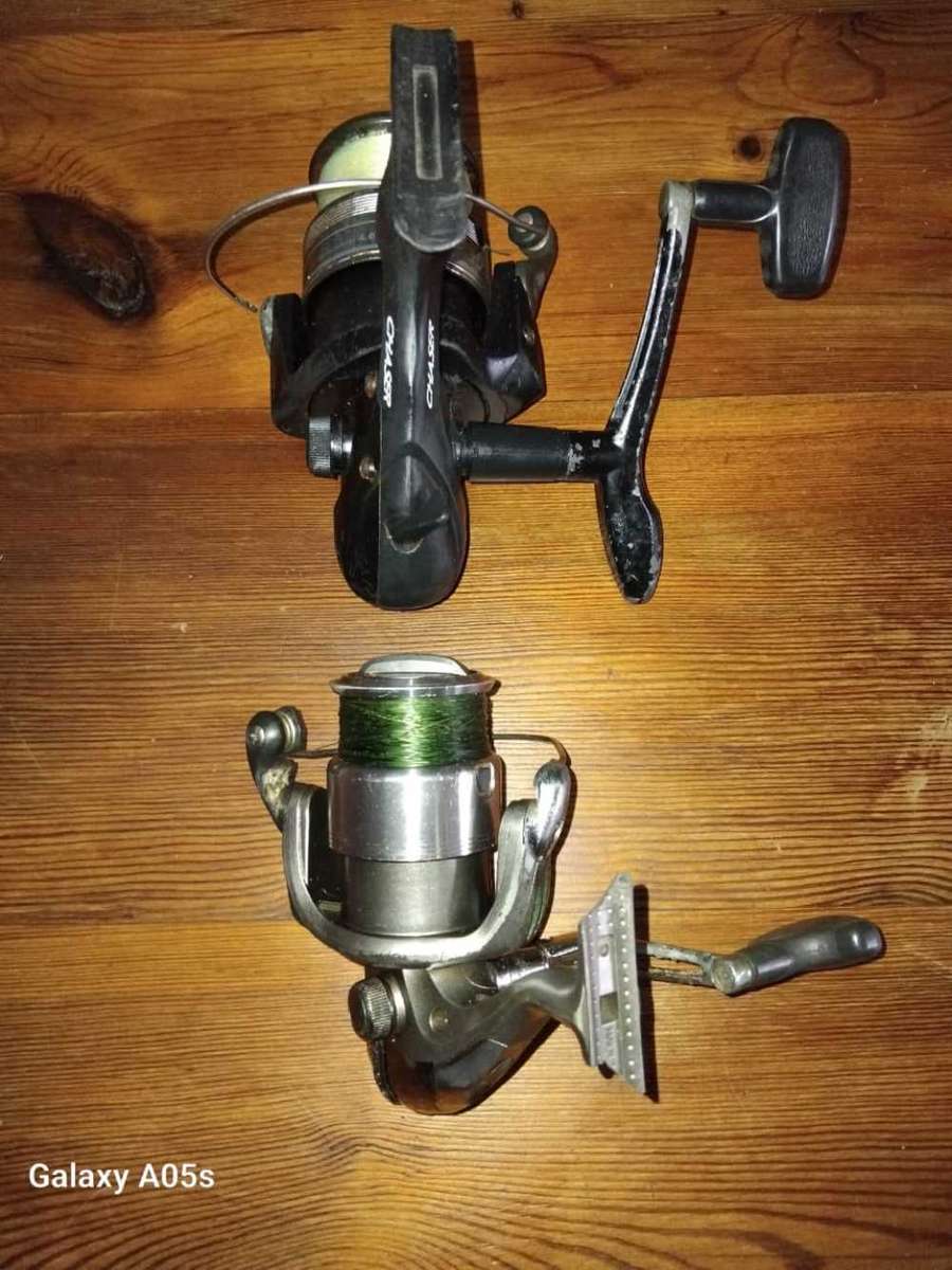 2 x SPINNING FISHING REELS.  NEED ATTENTION AS PER DESCRIPTION.