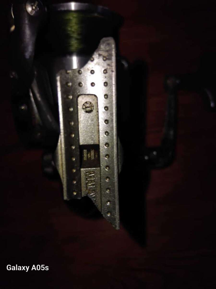 2 x SPINNING FISHING REELS.  NEED ATTENTION AS PER DESCRIPTION.