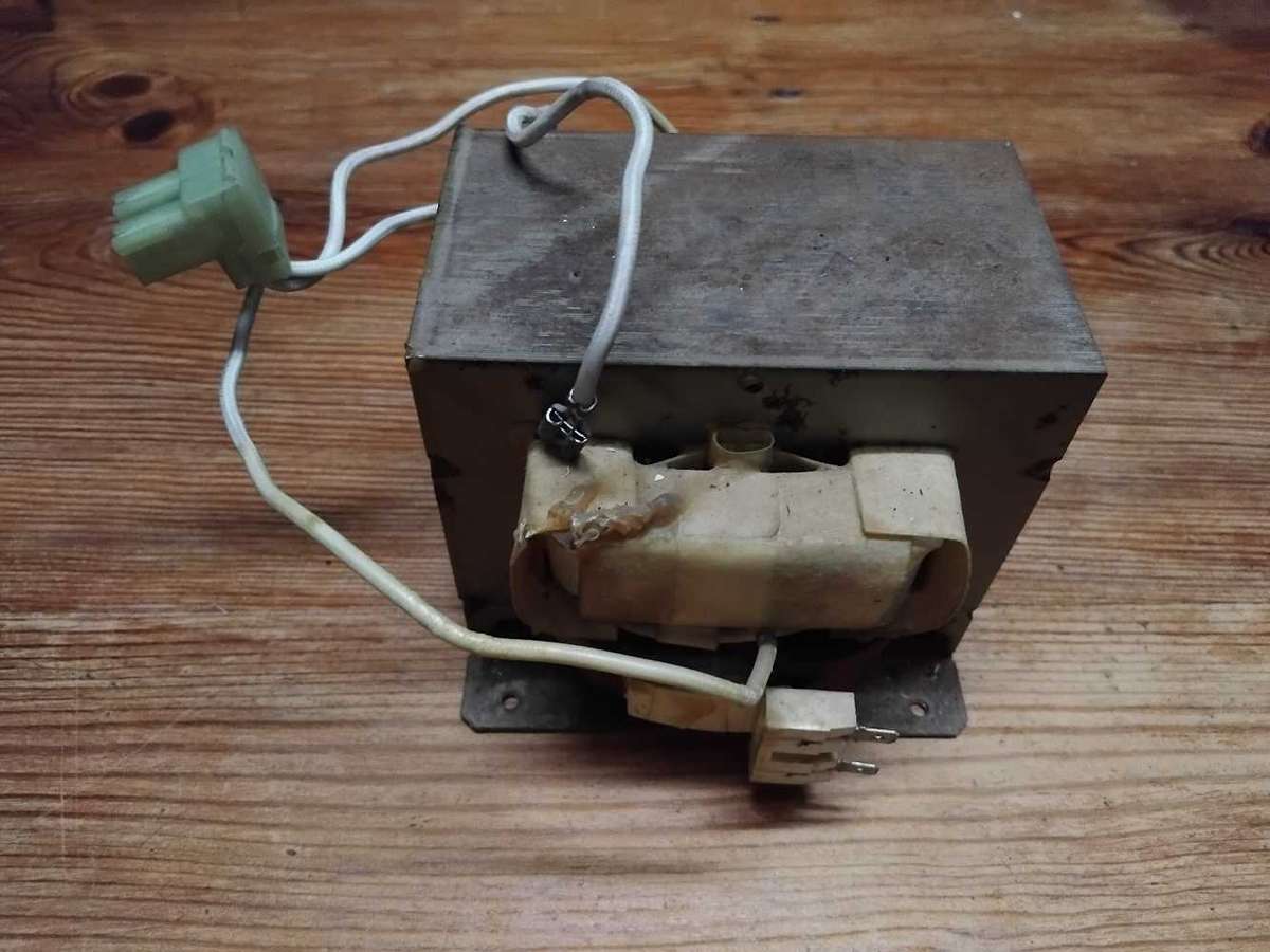 HIGH VOLTAGE TRANSFORMER FROM MICROWAVE.