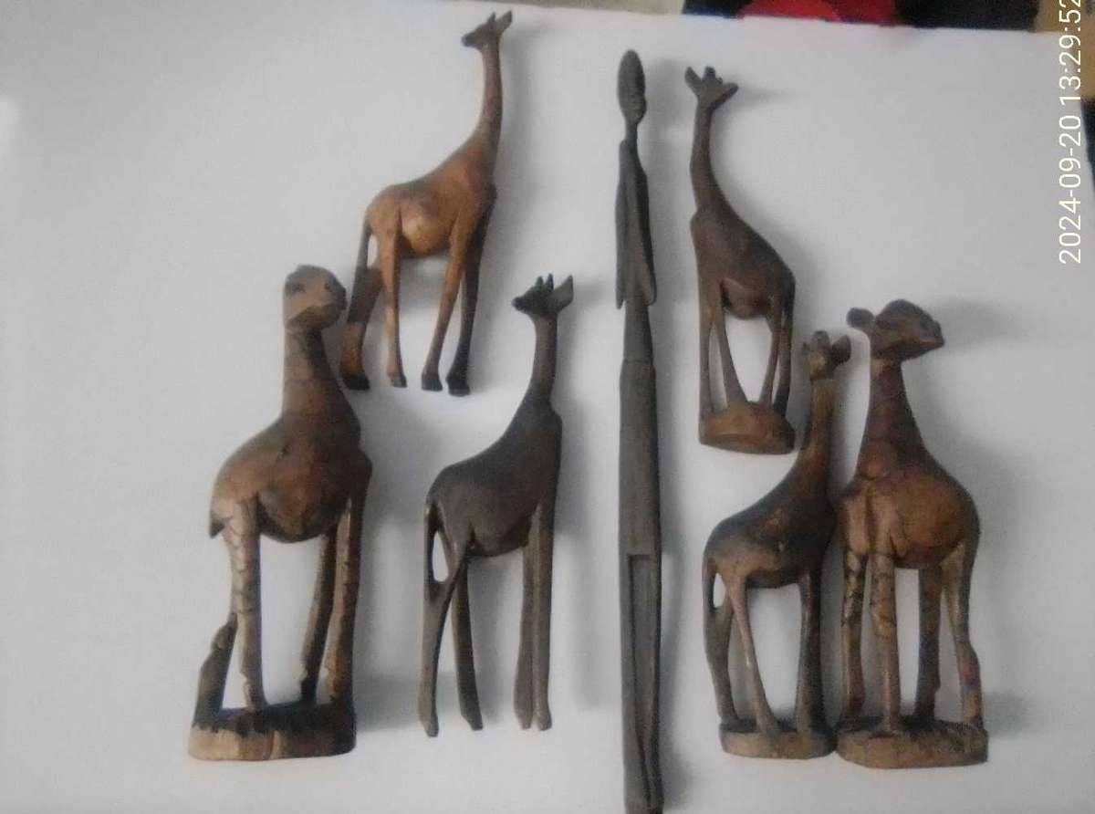 AFRICAN HAND CARVED WOODEN GIRAFFES AND FIGURINE.
