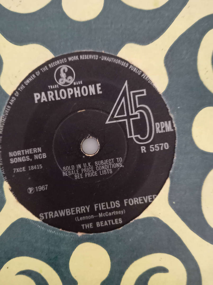 THE BEATLES / GEORGE HARRISON SEVEN SINGLES. AS PER PHOTOS.