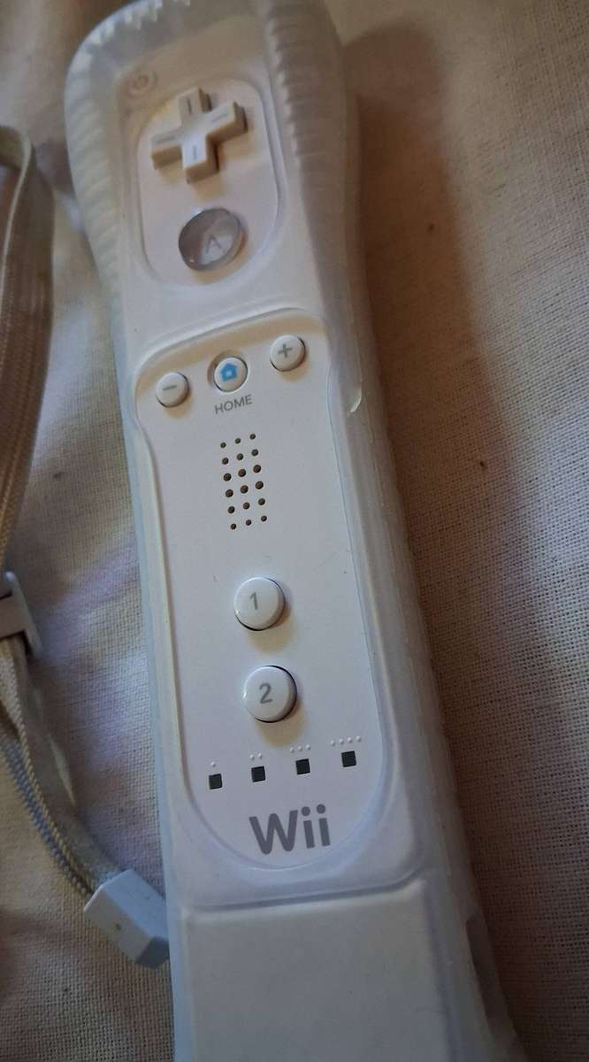 Official Nintendo Wii Remote with motion plus and Nunchuck