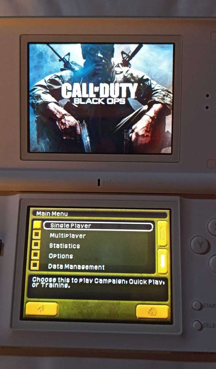 Nintendo DS Lite Console w/ original charger + 2 games