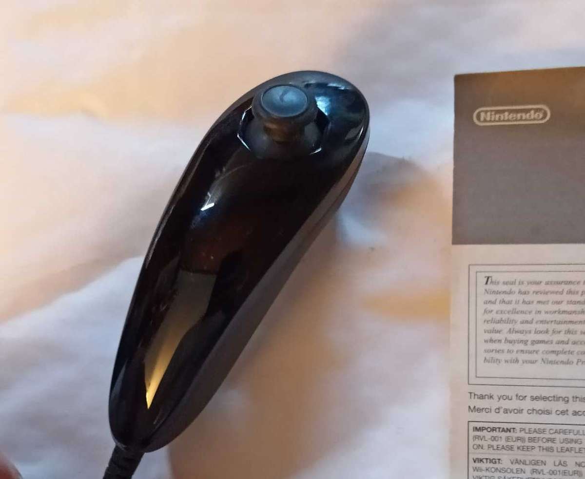 Original Nintendo Wii Nunchuck with manual