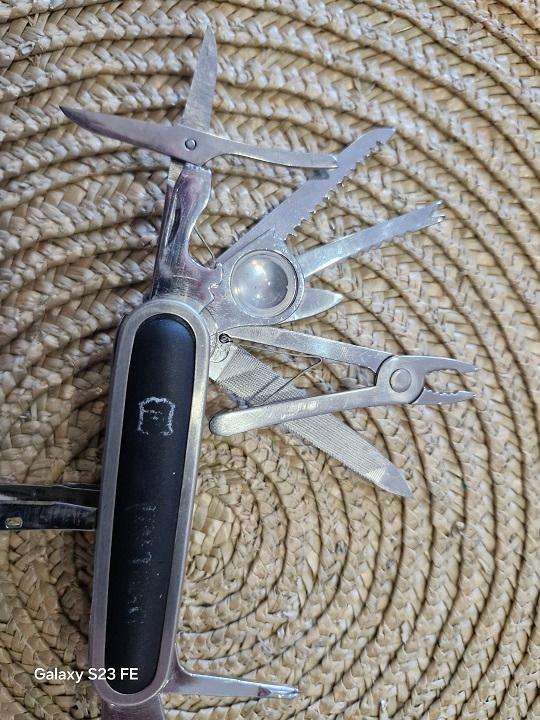 Bargain ! 15 attachments Swiss Army knife !! Markings worn, good condition !