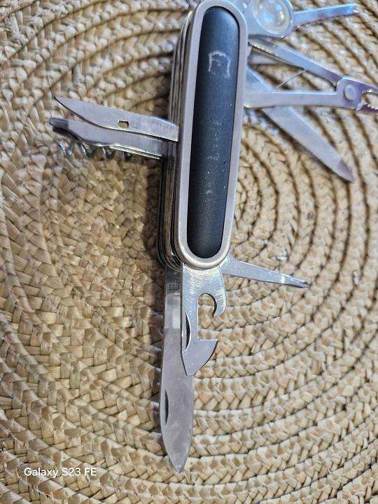 Bargain ! 15 attachments Swiss Army knife !! Markings worn, good condition !