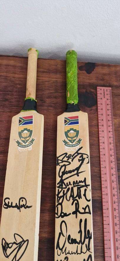 For the Sport Memorabilia Collector ! 2 x mini Cricket bats SA v England, signed !