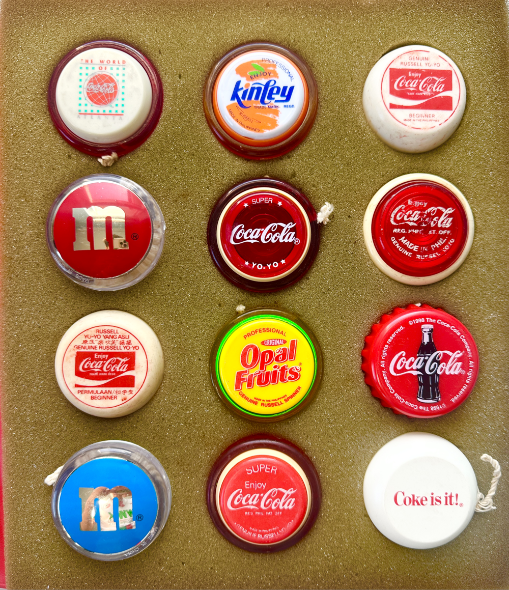 Stunning Collection of 12 Vintage Yo-Yos in Original Jack Russell Album with Collectible Pogs