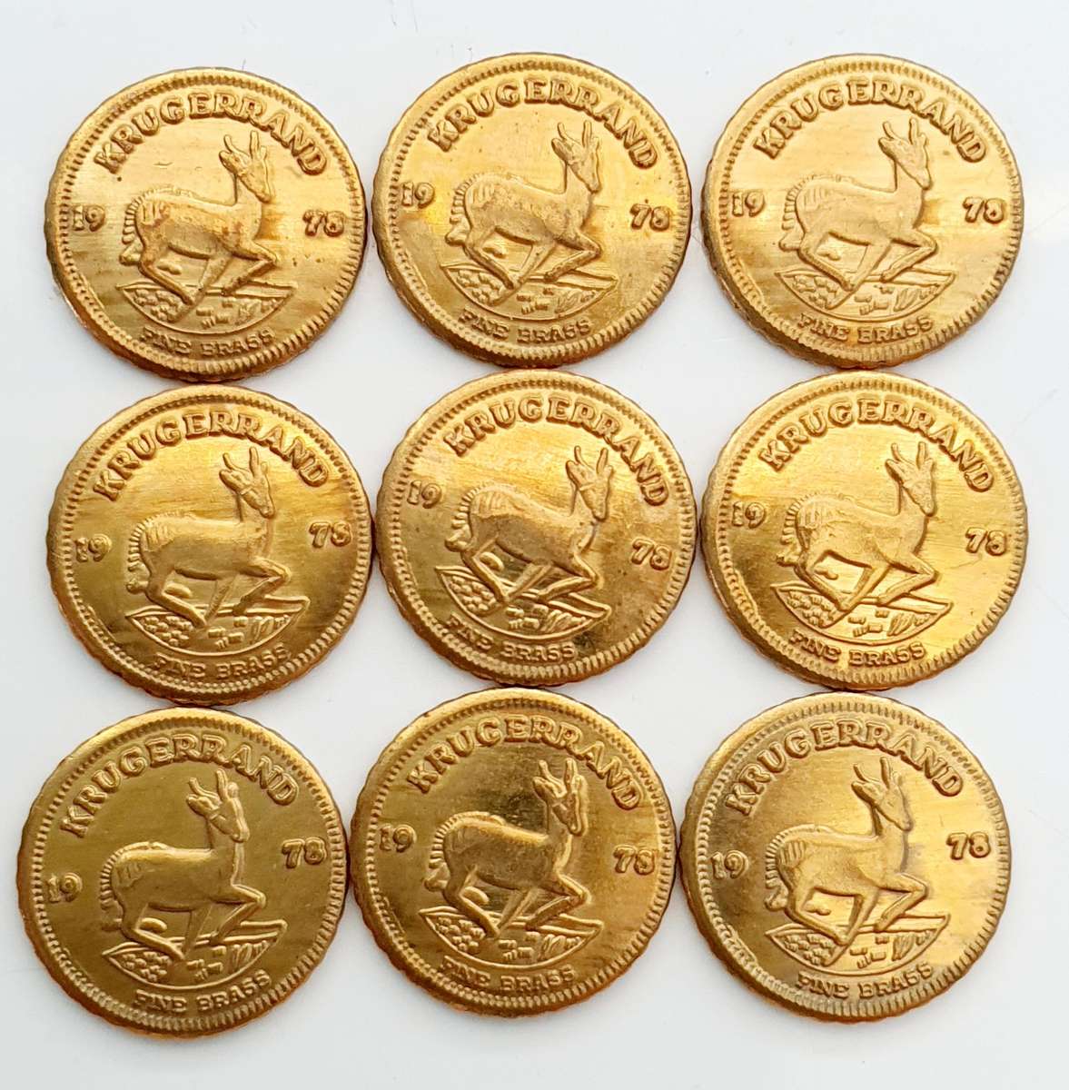 9 x 1978 Mini Fine Brass Krugerrand Tokens