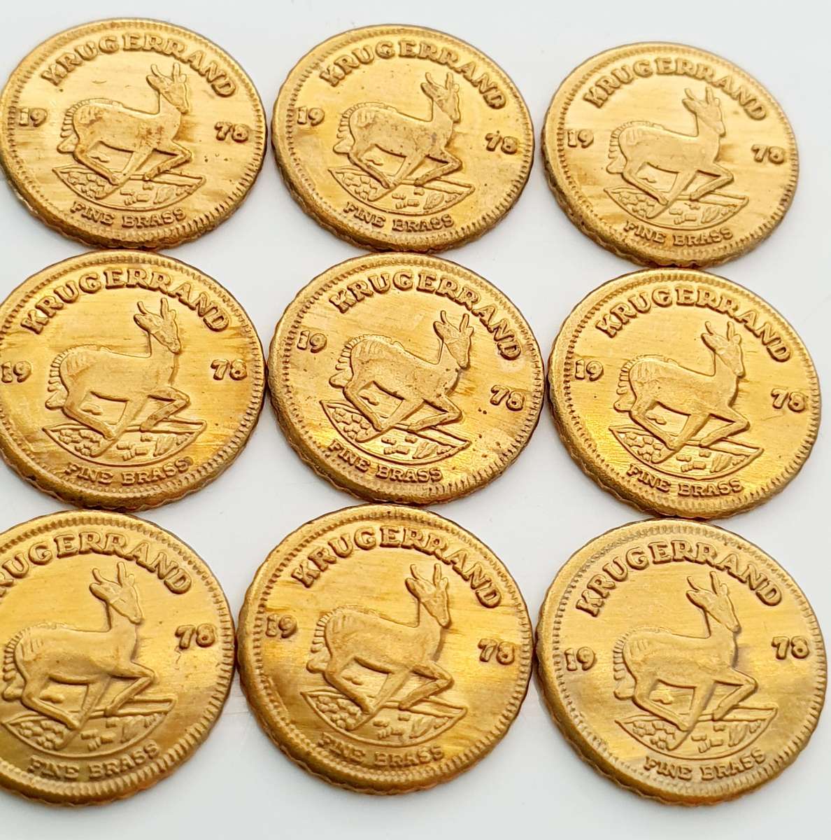 9 x 1978 Mini Fine Brass Krugerrand Tokens