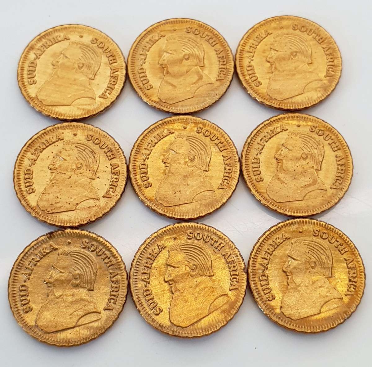 9 x 1978 Mini Fine Brass Krugerrand Tokens