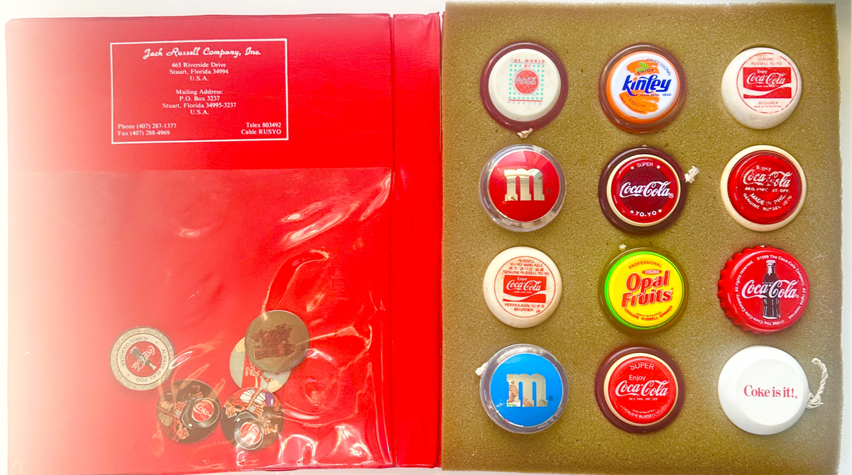 Stunning Collection of 12 Vintage Yo-Yos in Original Jack Russell Album with Collectible Pogs