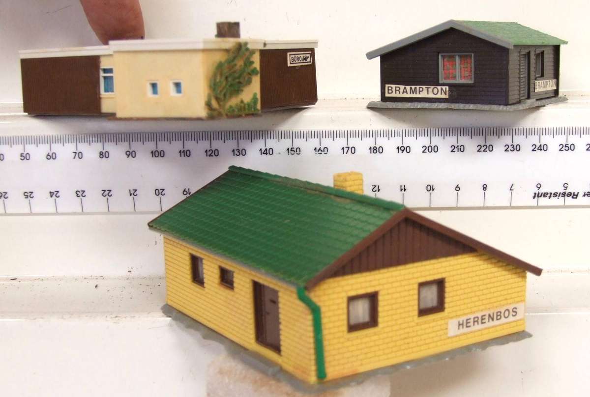 SCENERY N: On Auction are These N-Scale Buildings in Fair Used Condition.