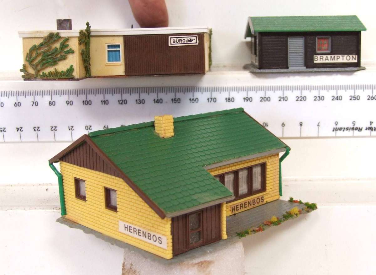 SCENERY N: On Auction are These N-Scale Buildings in Fair Used Condition.