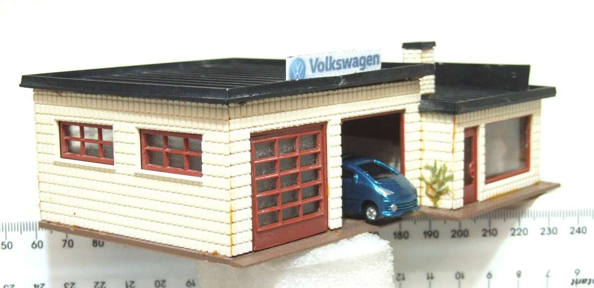SCENERY HO: On Auction is this Plastic VW Service Station in Fair Used Condition.