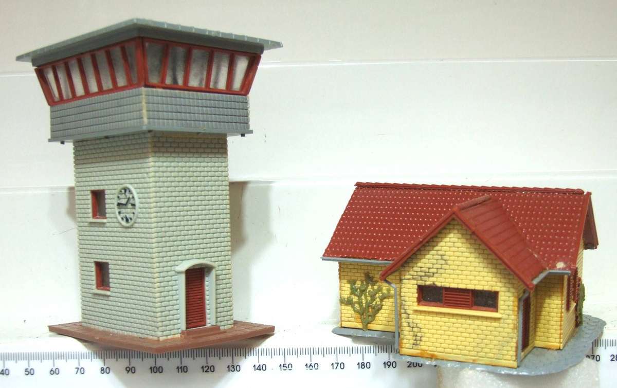 HELJAN HO:  On Auction are these Plastic Buildings in Fair Used Condition.