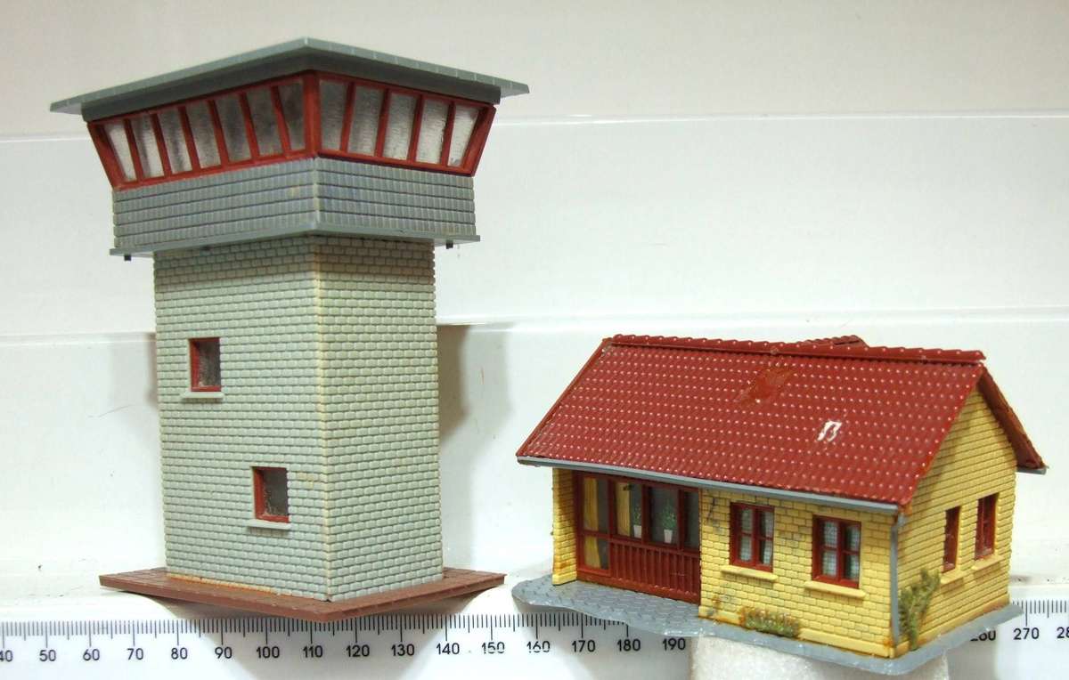 HELJAN HO:  On Auction are these Plastic Buildings in Fair Used Condition.