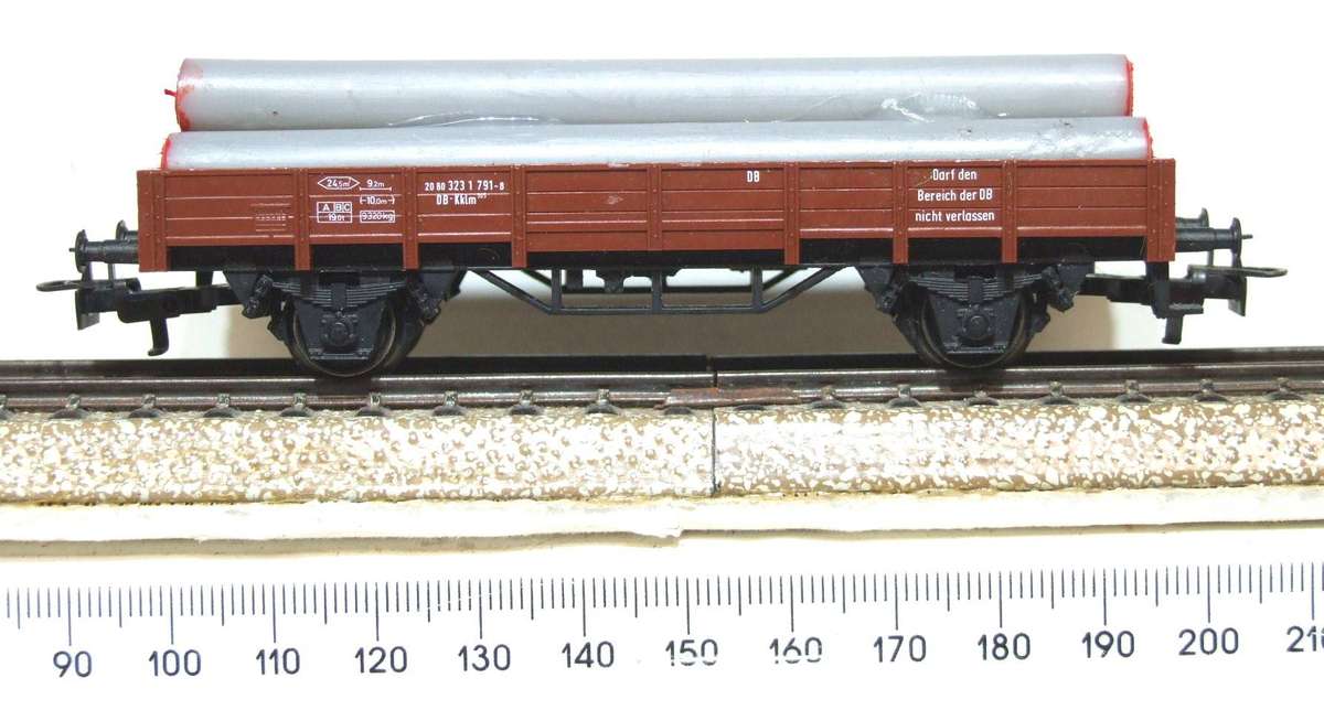 MARKLIN HO: More Modern DB Wagon with Pipe Load in Good Un-boxed, Used condition (W/GR)