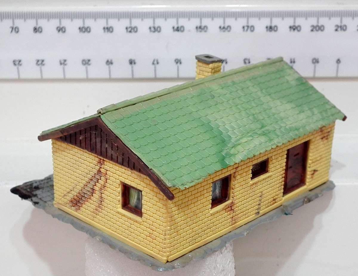 SENERY HO:  Plastic Residential House in Fair Used Condition.