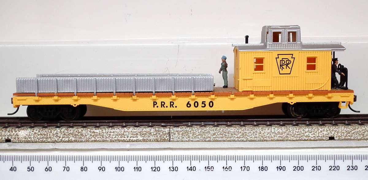 MEHANO HO:  P.R.R. Track Maintenance Car with Track Load in Good Un-Boxed condition.