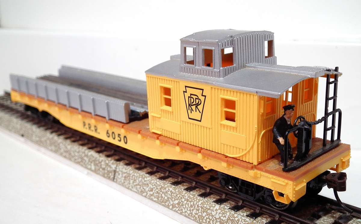 MEHANO HO:  P.R.R. Track Maintenance Car with Track Load in Good Un-Boxed condition.