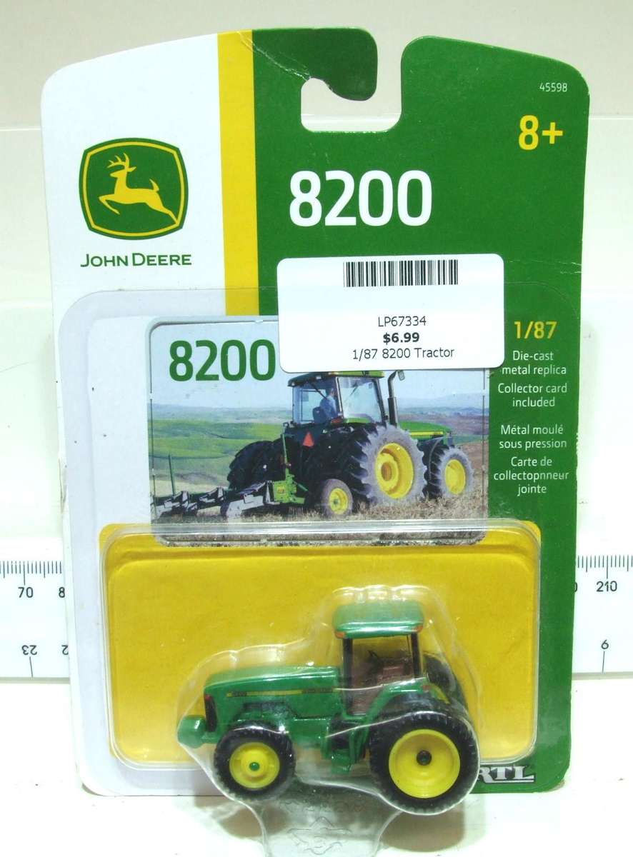 TOMY HO: Highly Detailed John Deere 8200  in New Boxed Condition.