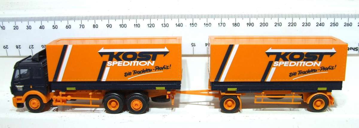 AMW HO: Highly Detailed " KOST" Mercedes Benz Truck & Trailer in Very Good Un-Boxed Condition.