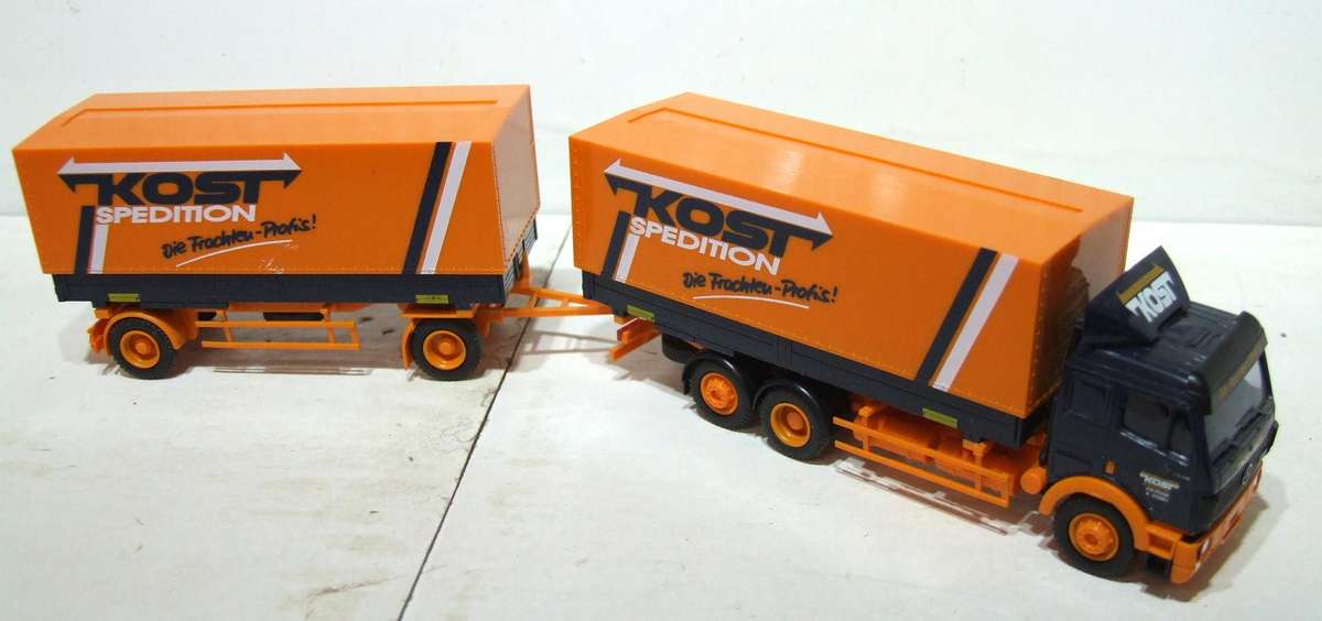 AMW HO: Highly Detailed " KOST" Mercedes Benz Truck & Trailer in Very Good Un-Boxed Condition.