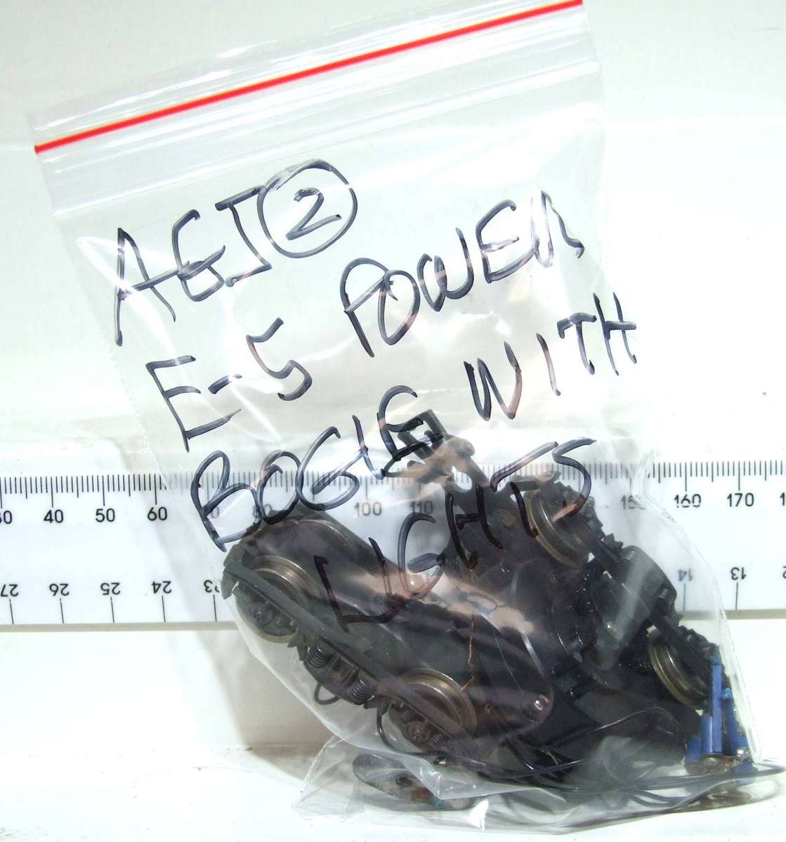 LIMA HO: SAR E5 Loco Power Bogies with Directional Lights in Good Condition for Parts.(Italy)