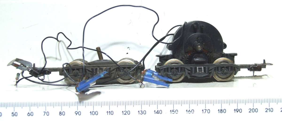 LIMA HO: SAR E5 Loco Power Bogies with Directional Lights in Good Condition for Parts.(Italy)