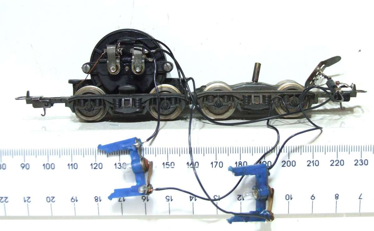 LIMA HO: SAR E5 Loco Power Bogies with Directional Lights in Good Condition for Parts.(Italy)