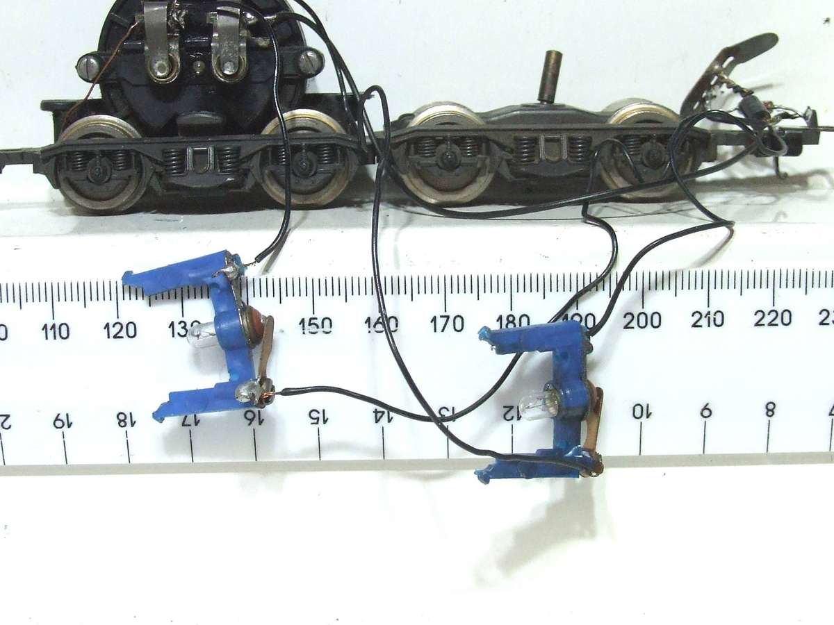 LIMA HO: SAR E5 Loco Power Bogies with Directional Lights in Good Condition for Parts.(Italy)