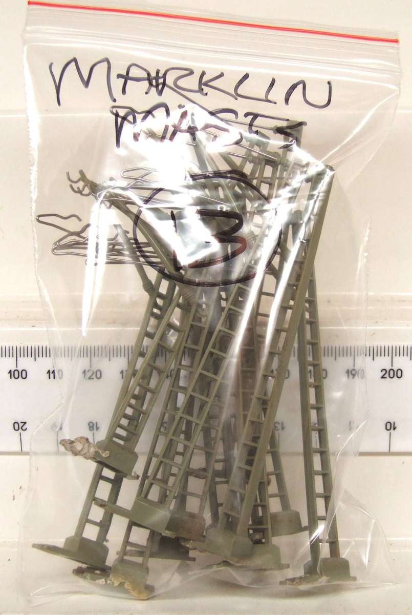MARKLIN HO:  On Auction are these 13pc Overhead Centenary Masts in Good Used Condition.(GR)