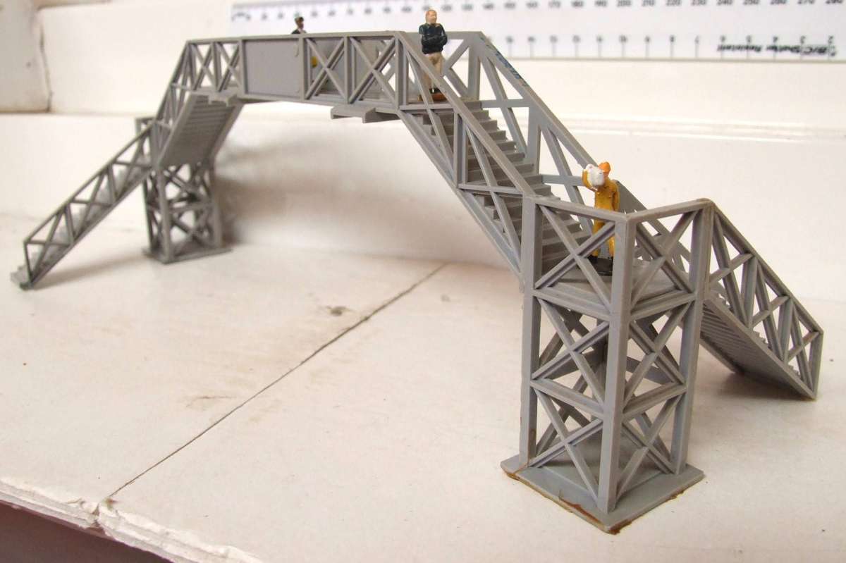 SCENERY HO:  On Auction is this Plastic Double Track Pedestrian Crossing in Fair Used Condition.