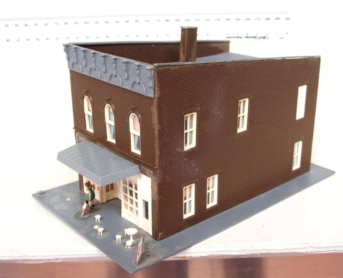 SCENERY HO:  On Auction is this European Plastic Multi Story Building in Fair Used Condition.