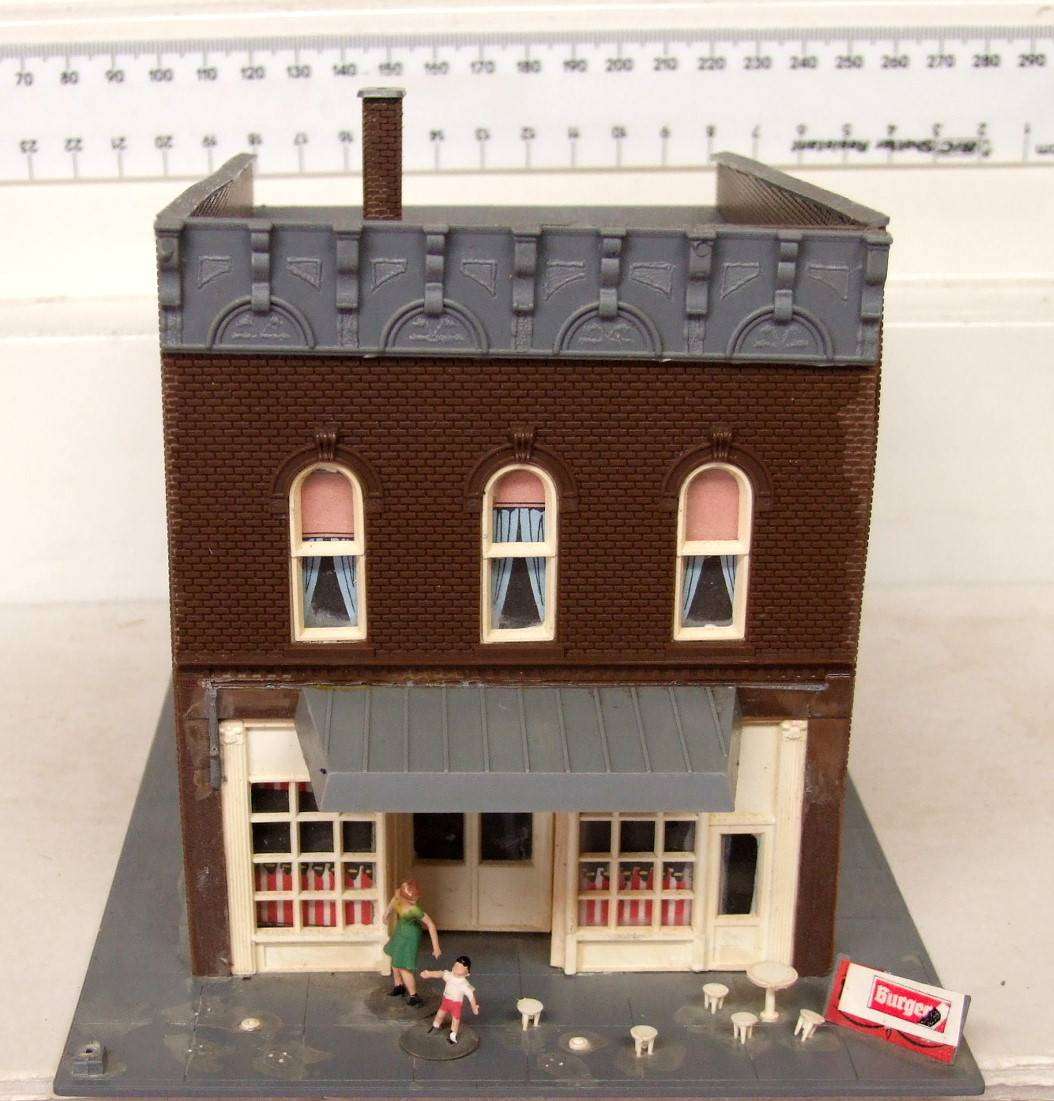 SCENERY HO:  On Auction is this European Plastic Multi Story Building in Fair Used Condition.