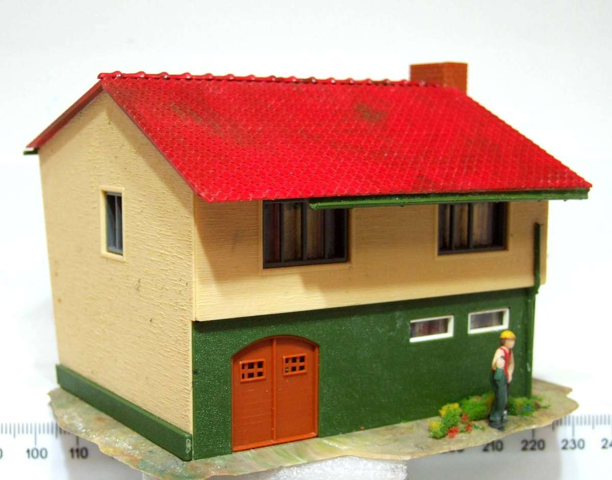 FALLER HO:  On Auction is this Plastic Building in Fair Used Condition.