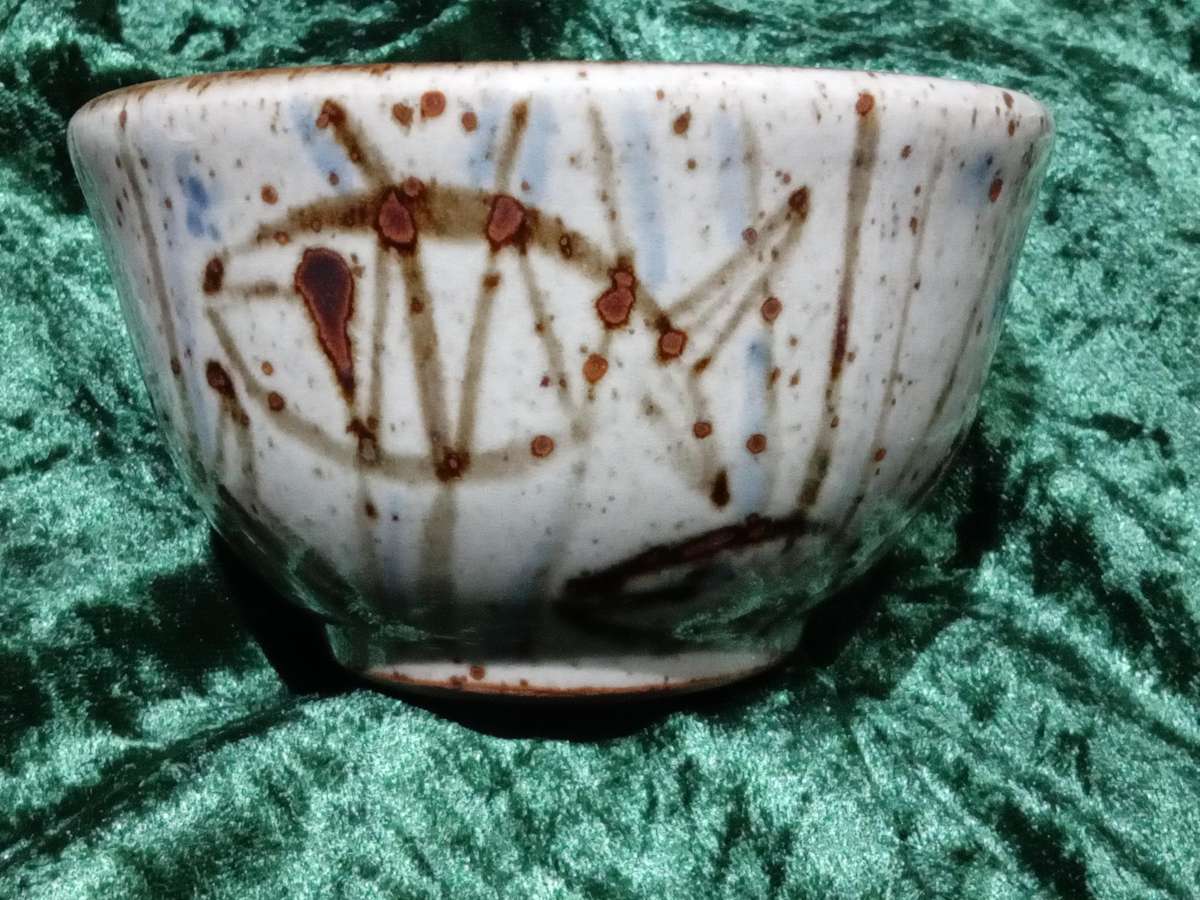 South African Pottery - Small bowl fish between reeds Back Stamped with an "S" Blue and brown glaze