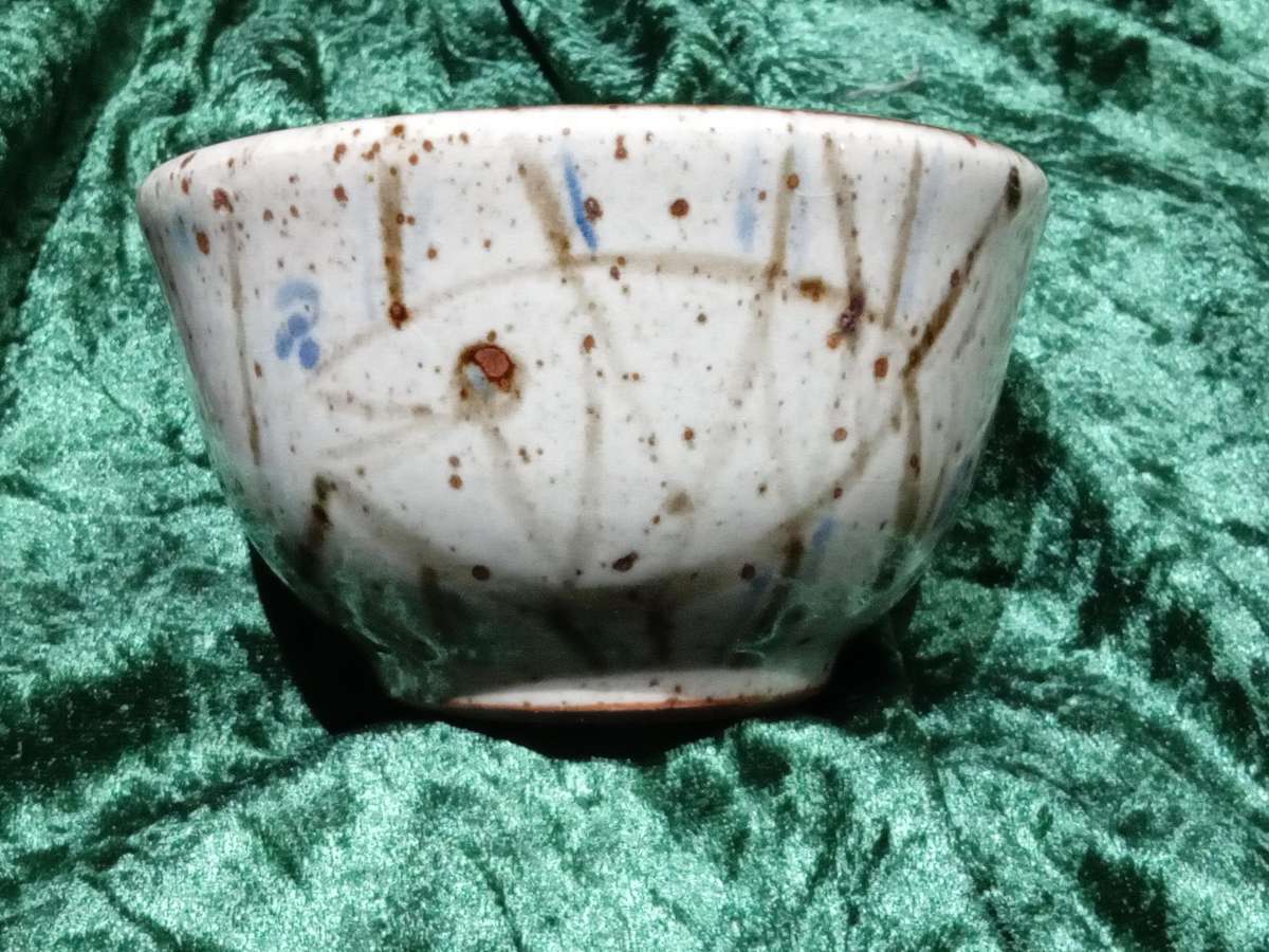 South African Pottery - Small bowl fish between reeds Back Stamped with an "S" Blue and brown glaze