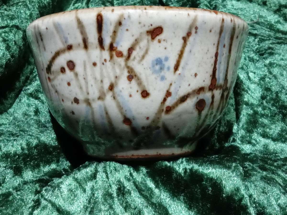 South African Pottery - Small bowl fish between reeds Back Stamped with an "S" Blue and brown glaze