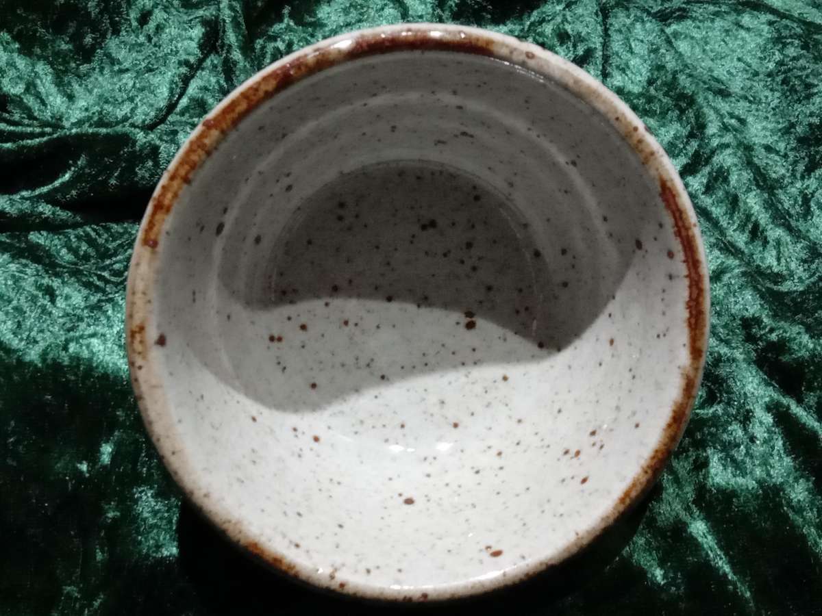 South African Pottery - Small bowl fish between reeds Back Stamped with an "S" Blue and brown glaze