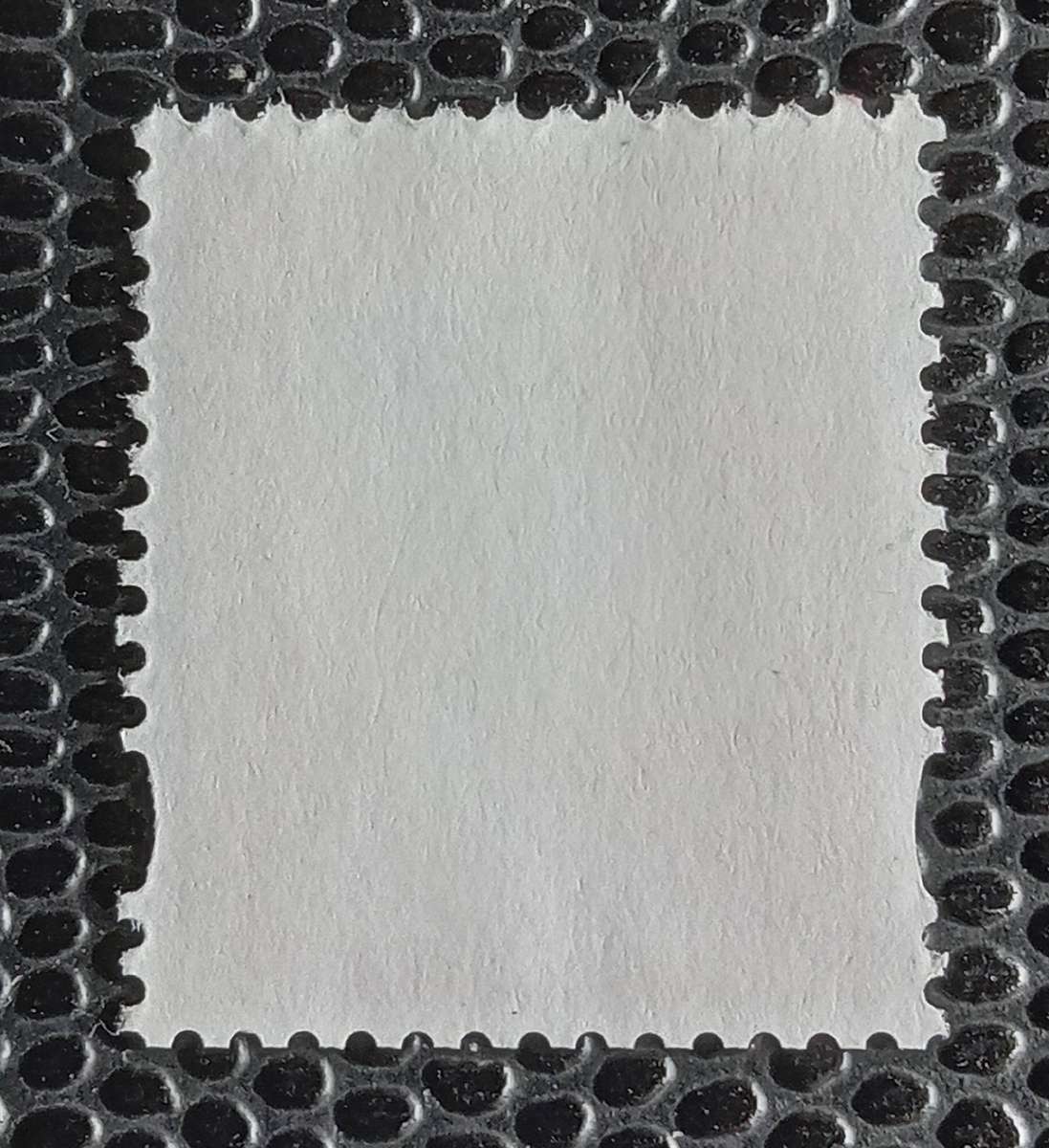 Used England Stamp. 1st Class mail Machin with eliptical perf holes