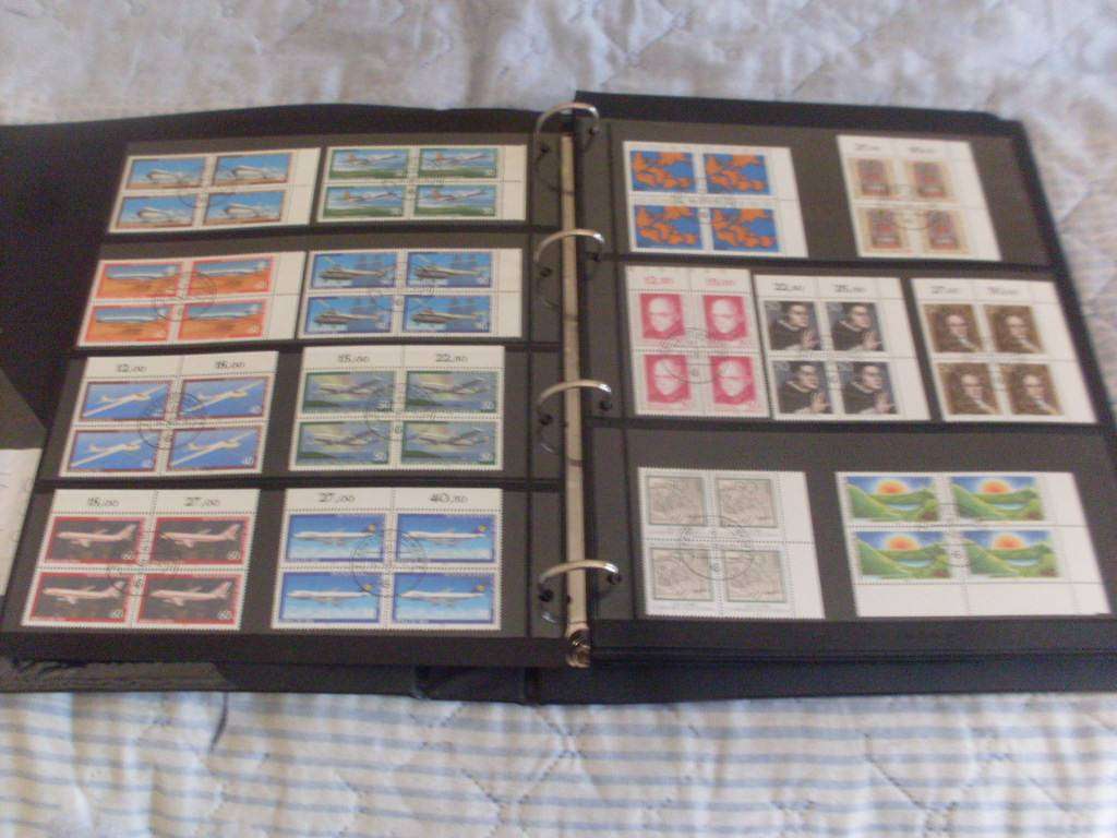 GERMAN FILE WITH + - 200 BLOCKS OF 4 POSTAGE STAMPS AND SOME SINGLES TOO