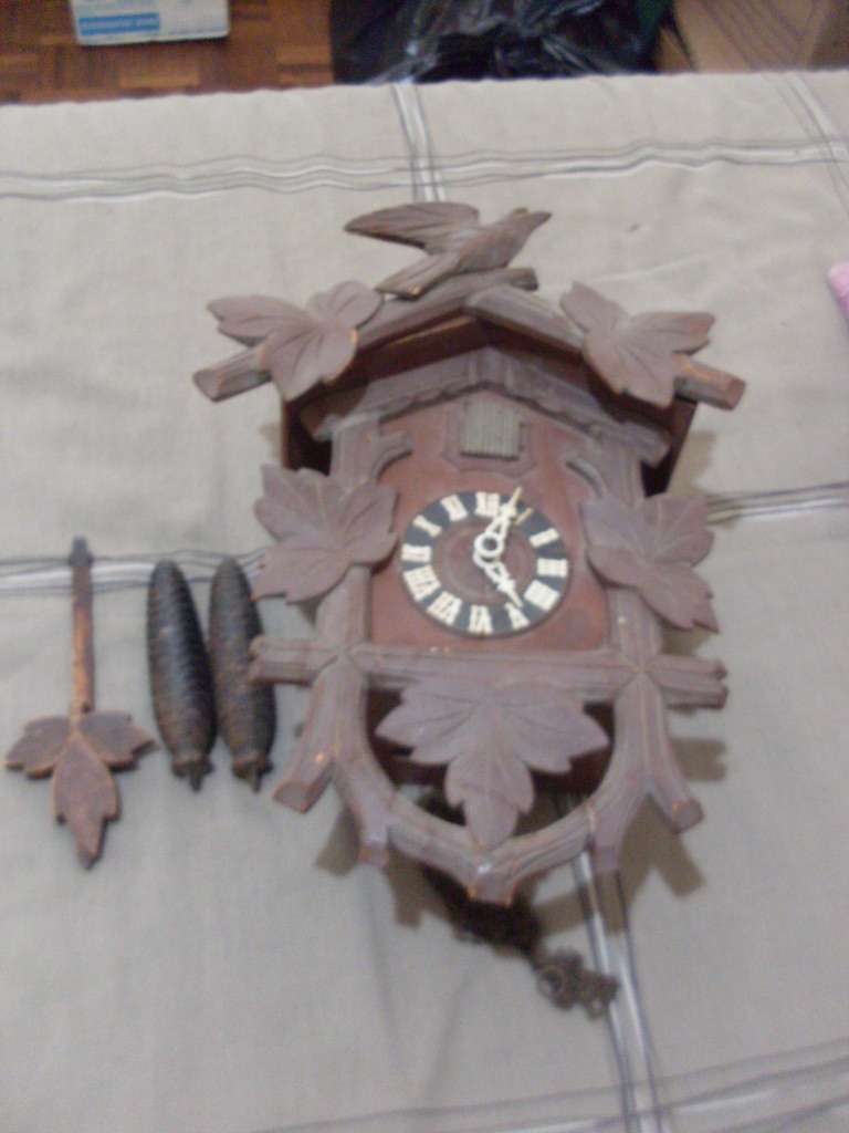 VINTAGE GERMAN CUCKOO CLOCK...WORKING...MAKER HUBERT HERR TRIBERG