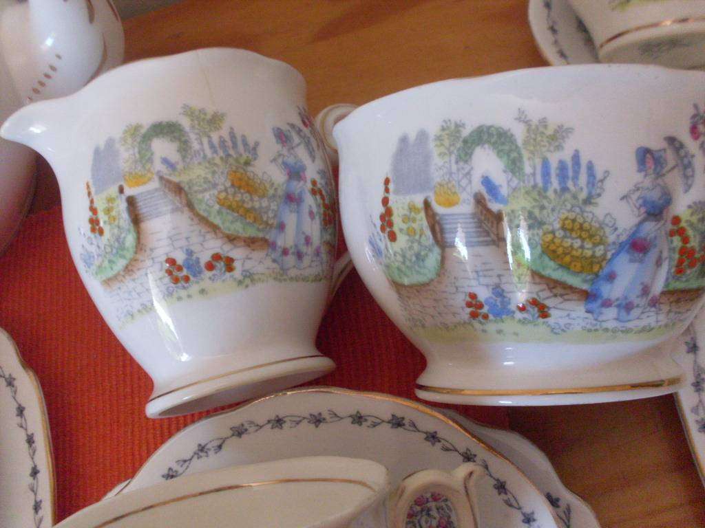22 PIECE VINTAGE BELL CHINA TEASET....WALKING IN THE GARDEN DESIGN....