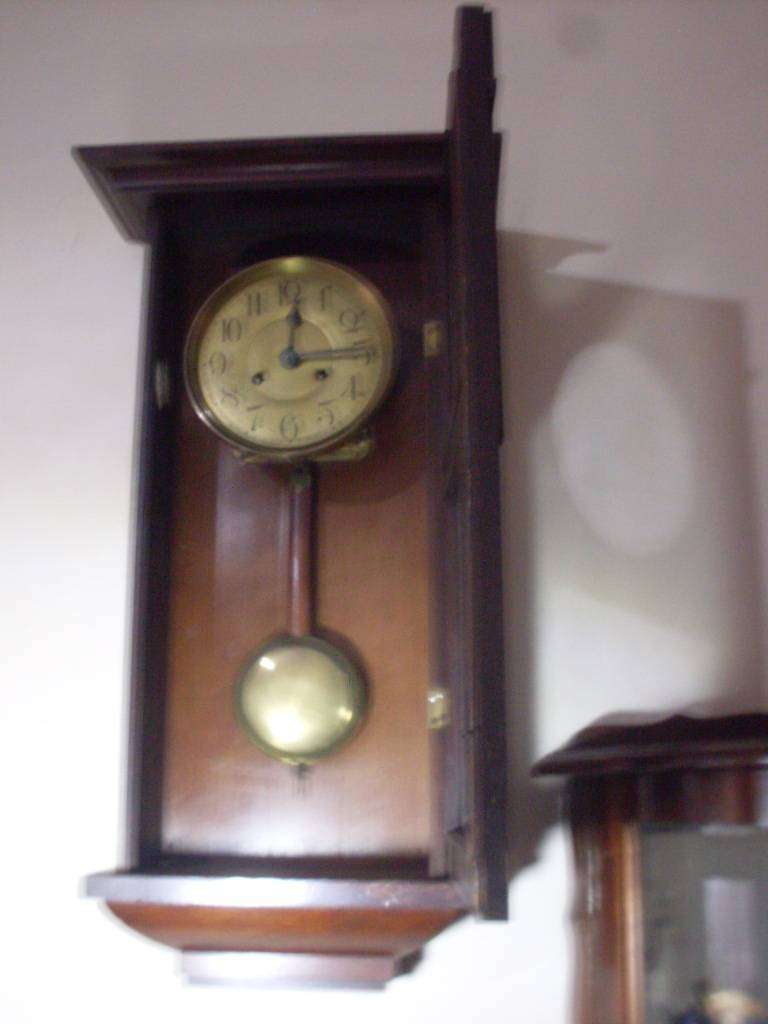 LARGE VINTAGE WALL CLOCK...WORKS ERRATICALLY ...NEEDS ATTENTION