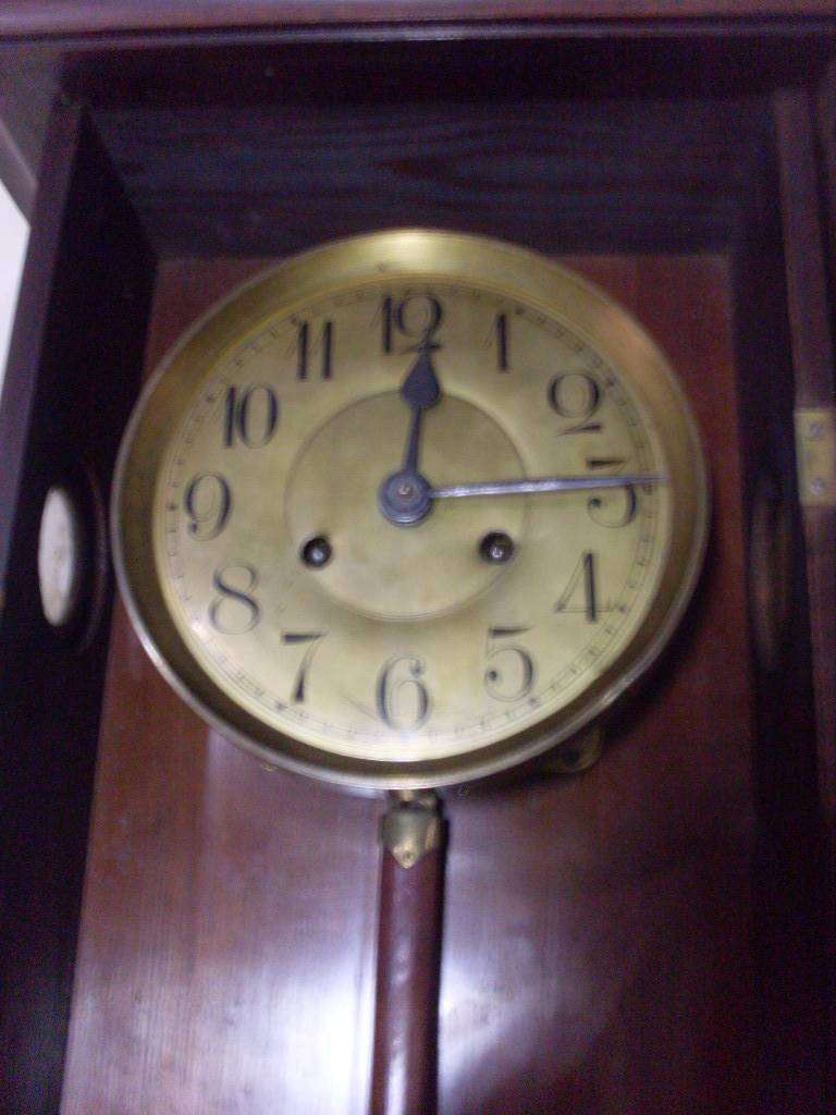 LARGE VINTAGE WALL CLOCK...WORKS ERRATICALLY ...NEEDS ATTENTION