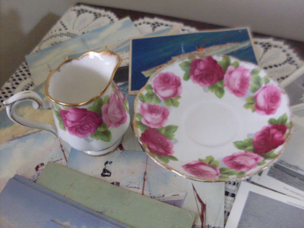 SMALL ROYAL ALBERT MILKJUG AND SAUCER...OLD ENGLISH ROSE PATTERN